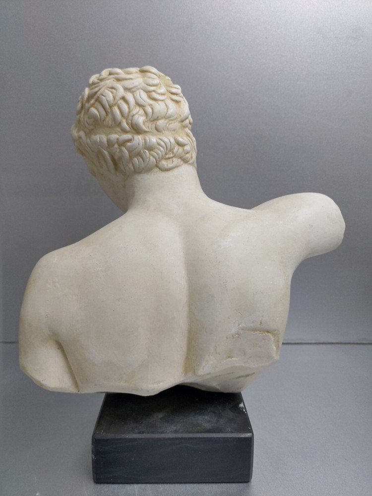 Ephebe bust sculpture on black marble base