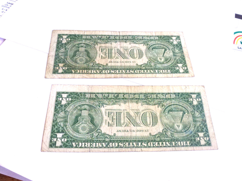 well worn silver certificates. $1.00 1957