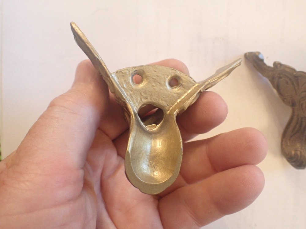 TWO FRONT FEET FOR BLACK MANTEL CLOCK