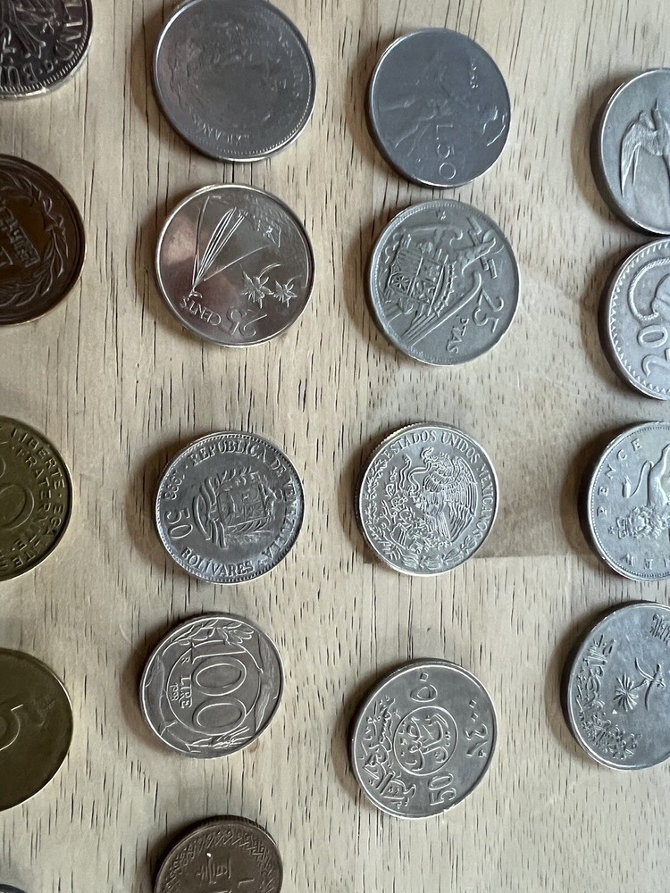 Assorted foreign coins. 26 Coins In Total