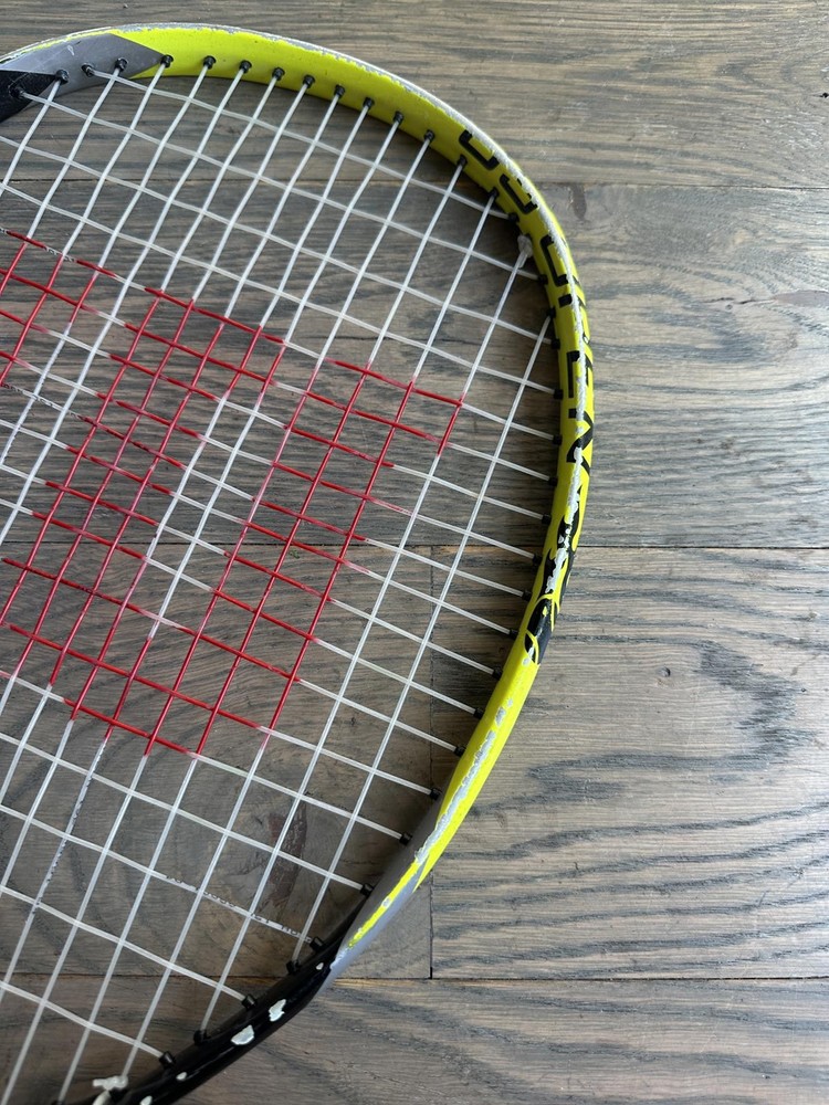Wilson Tennis Racquet with Red String Pattern