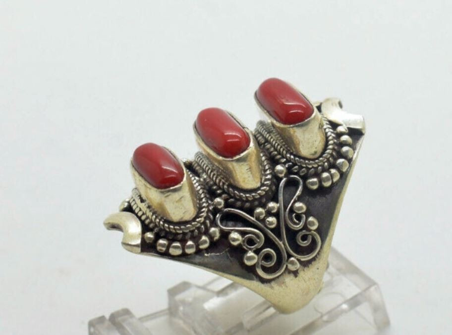 This is Sterling Silver Ring with Coral . adjustable fit