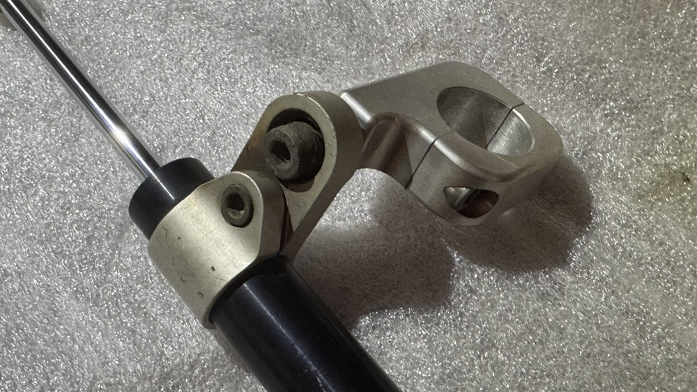 storz performance 5 1/2" travel 9 click adjustable steering damper