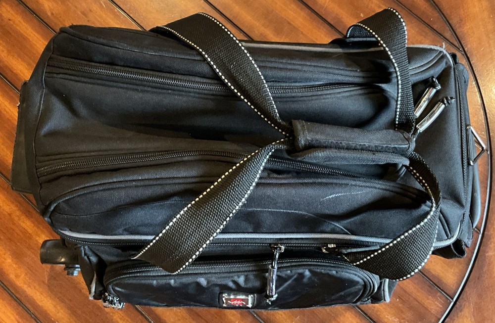 2 Bowling Balls And Roller Carry Case