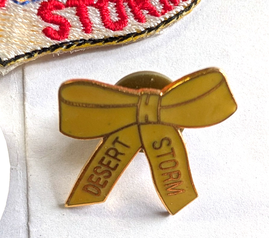 Operation Desert Storm pinback button, yellow ribbon pin, and patch