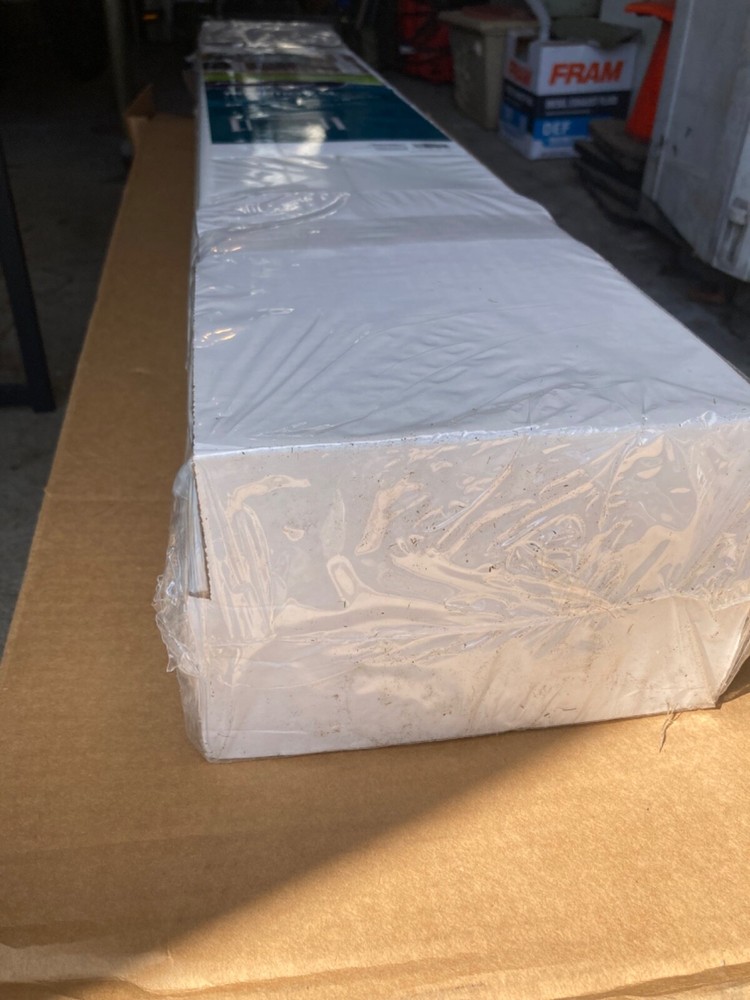 New white with black spindled Veranda gate post.