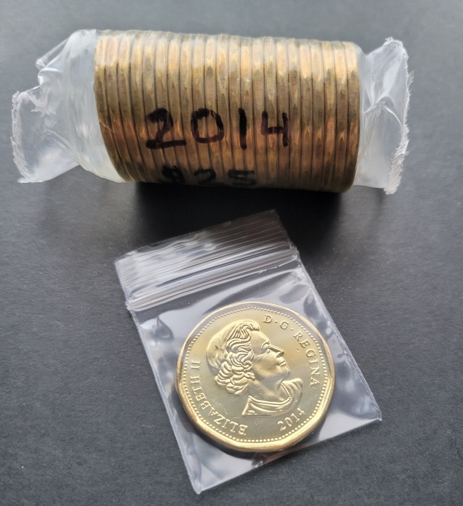*** CANADA  LOONIE  2014  *** FROM  MINT  ROLL  ***