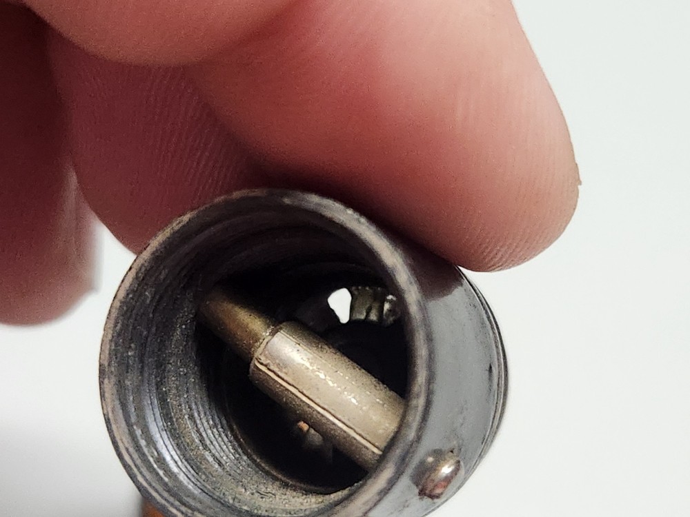 Packard Cigarette Lighter Cats Eye Bakelite Trim