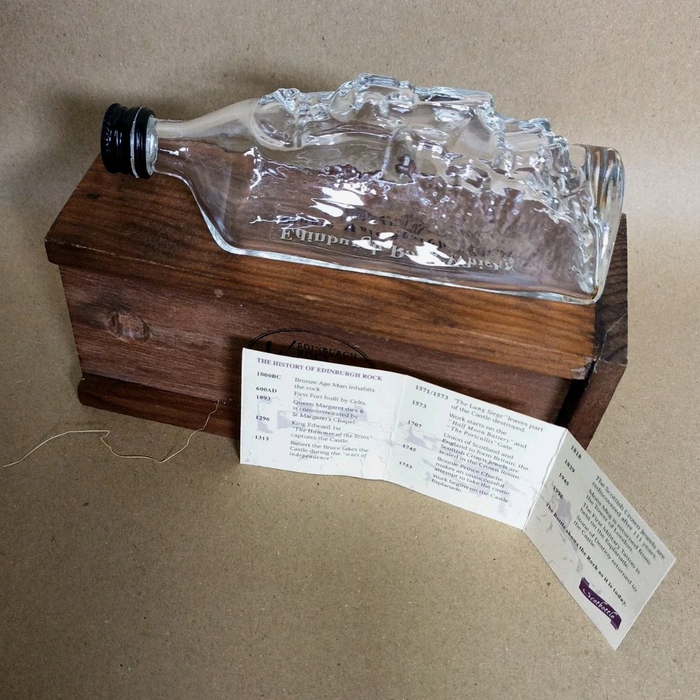 Collectable Edinburgh Rock Whisky bottle and presentation box 10cl. EMPTY.