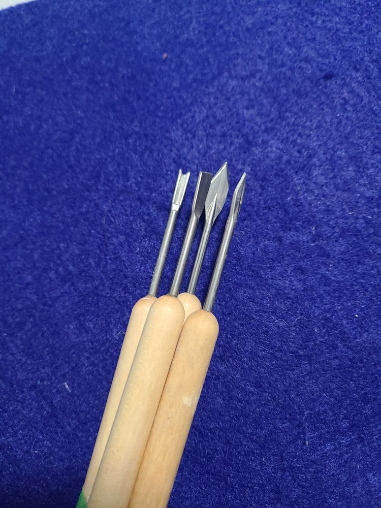 Set Of Four Pottery trimming tools
