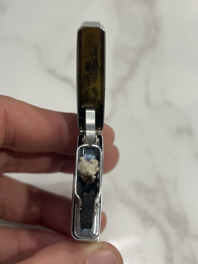 vintage “lowrey” silver matchbox holder
