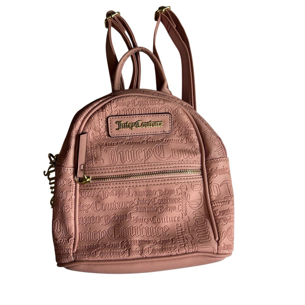 Backpack Elegant Juicy Couture backpack in blush. Embossed logo design. Includes