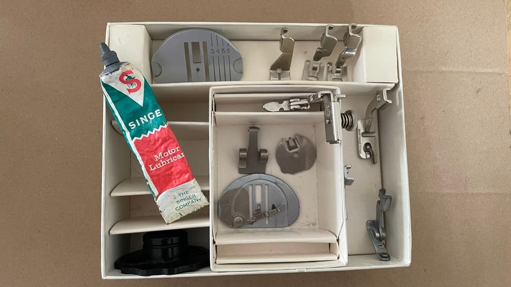 Two Singer Vintage Boxes with some accessories