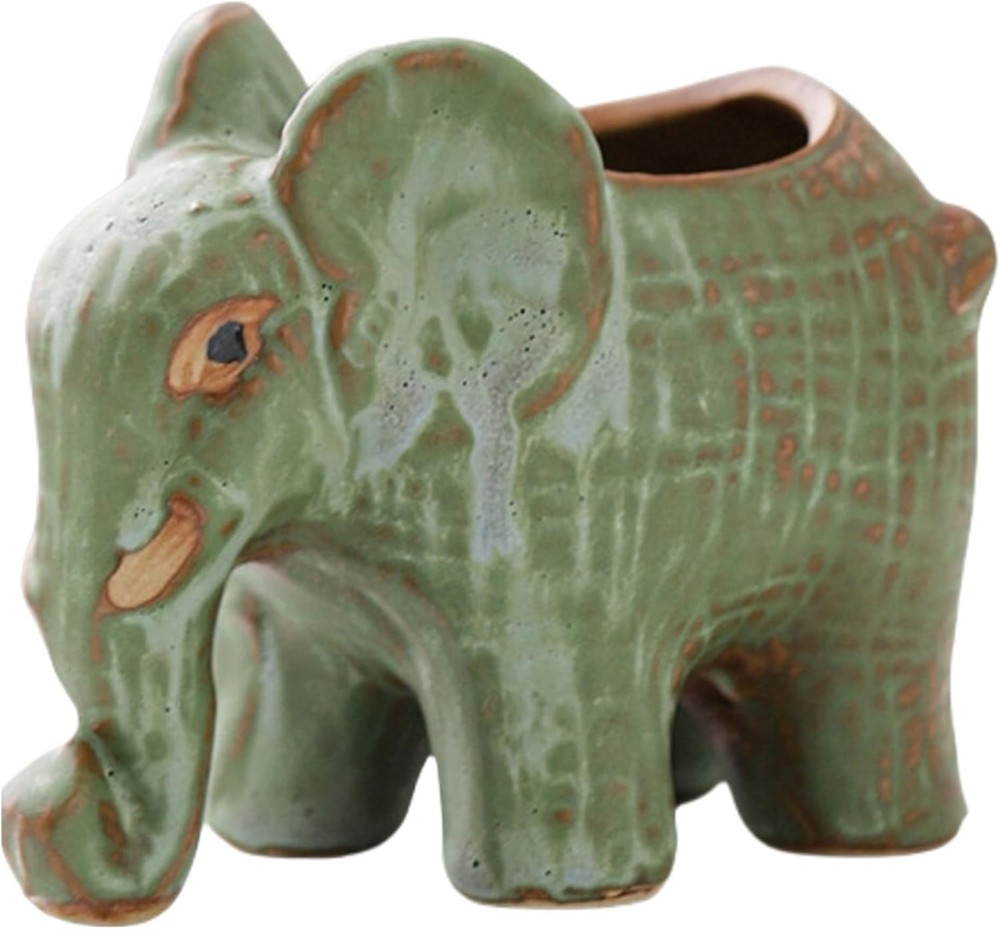 Cute elephant-shaped ceramic succulent planter.