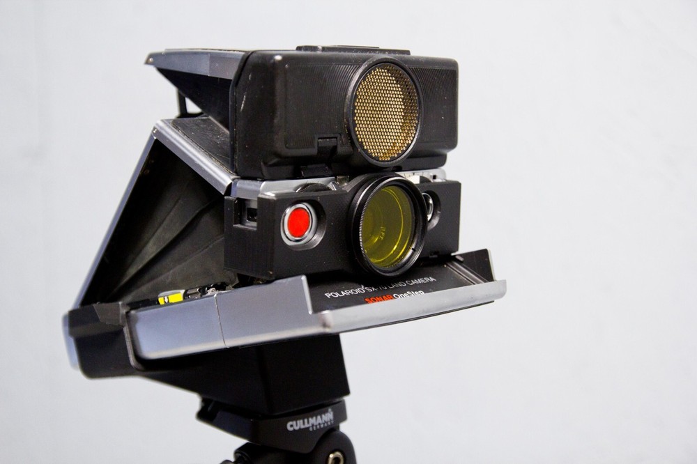 Tripod mount for Polaroid SX-70 Instant camera