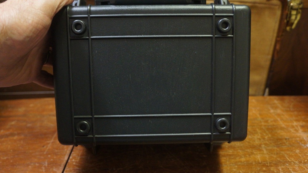 NICE BLACK HARD PLASTIC BOX WITH 20 GRADED COIN SLOTS--DOESNT LOCK TABS SECURE