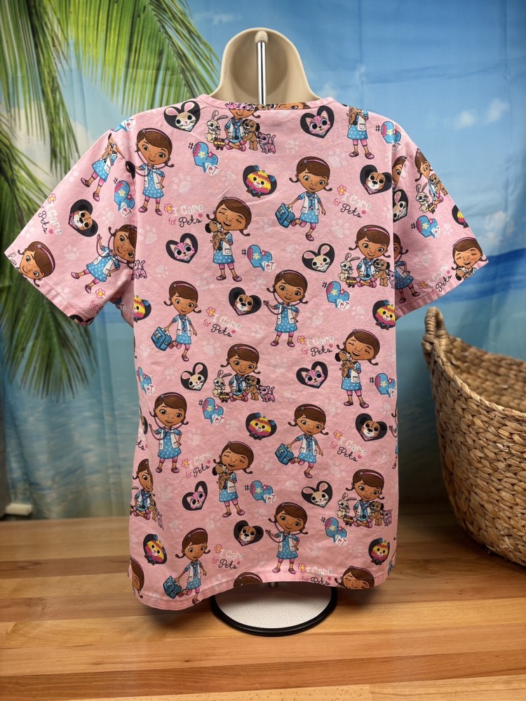 Women’s Disney Doc McStuffins Pink Scrub Top Size Medium