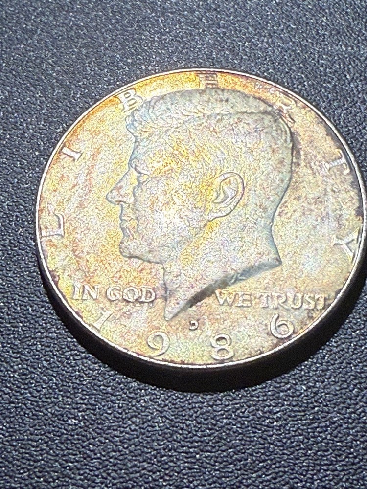 1986 - D Kennedy Half Dollar TONED