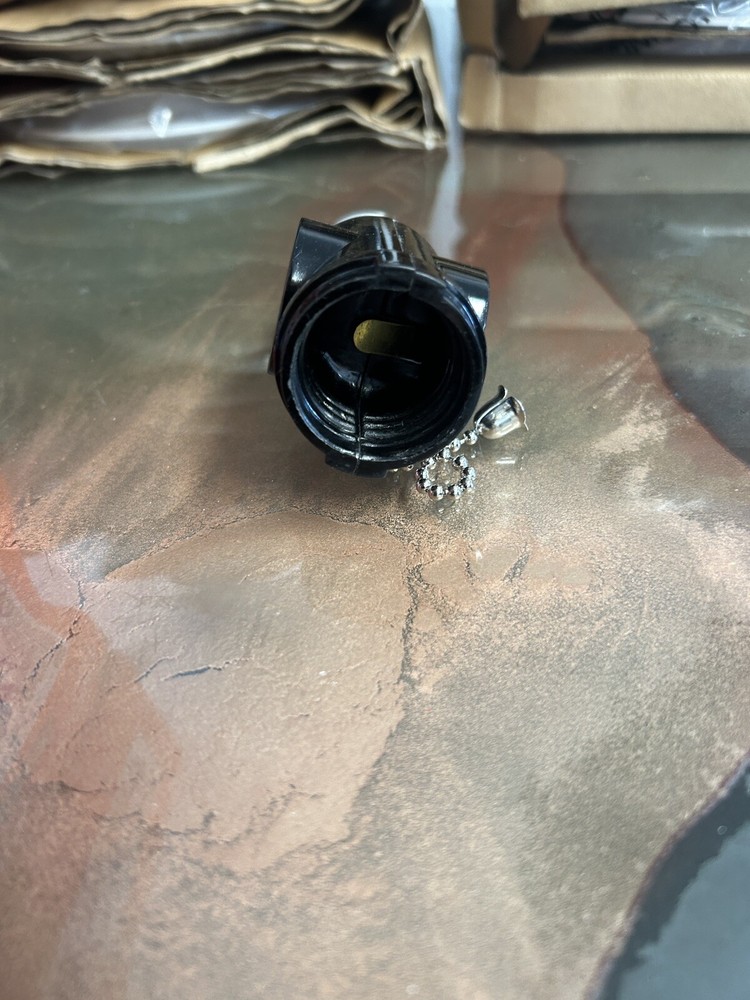 Two Outlet w/ Pull Chain Socket Adapter 660 Watt, 125 Volt.