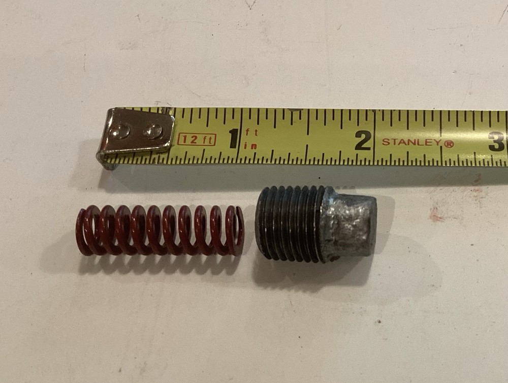 Troy Bilt Horse depth regulator spring and plug.