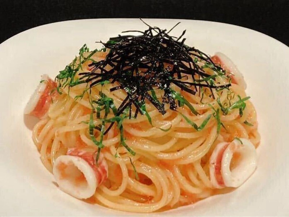 Food replica squid and cod roe pasta with plate