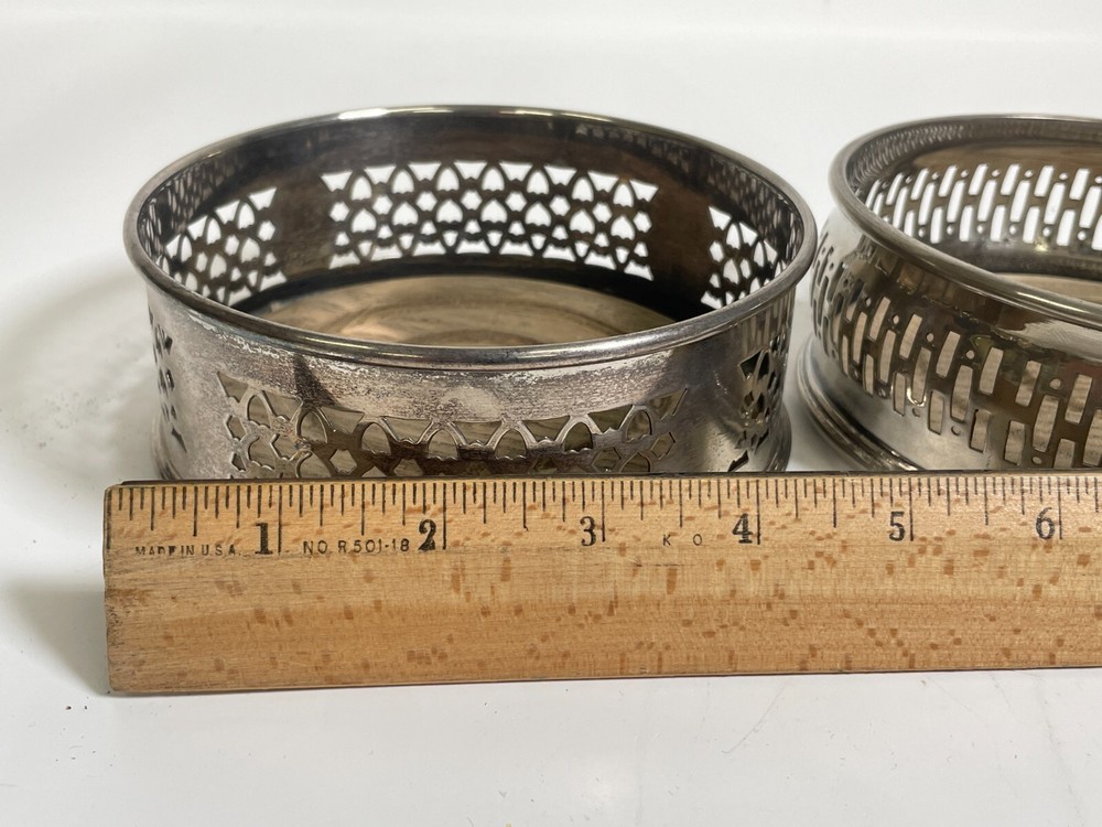 2 Silver Plated Bottle Caster Set Wood Base