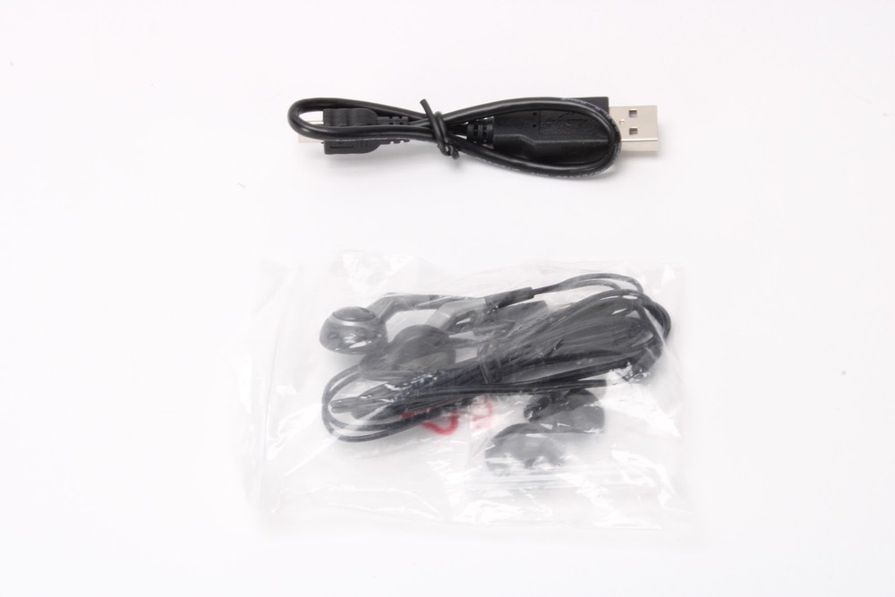 Philips DVT2000 Voice Tracer With USB Cable, Earbuds, and Quick Start Guide