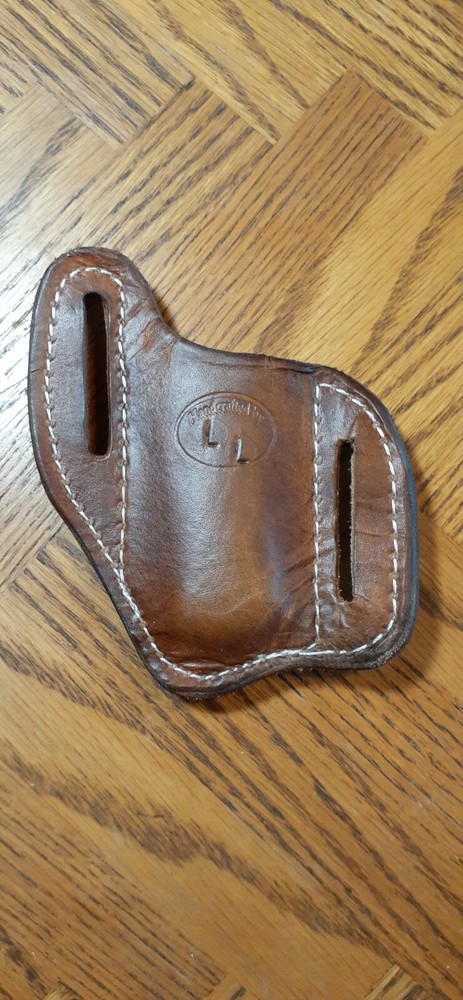 Handcrafted leather folding knife sheath