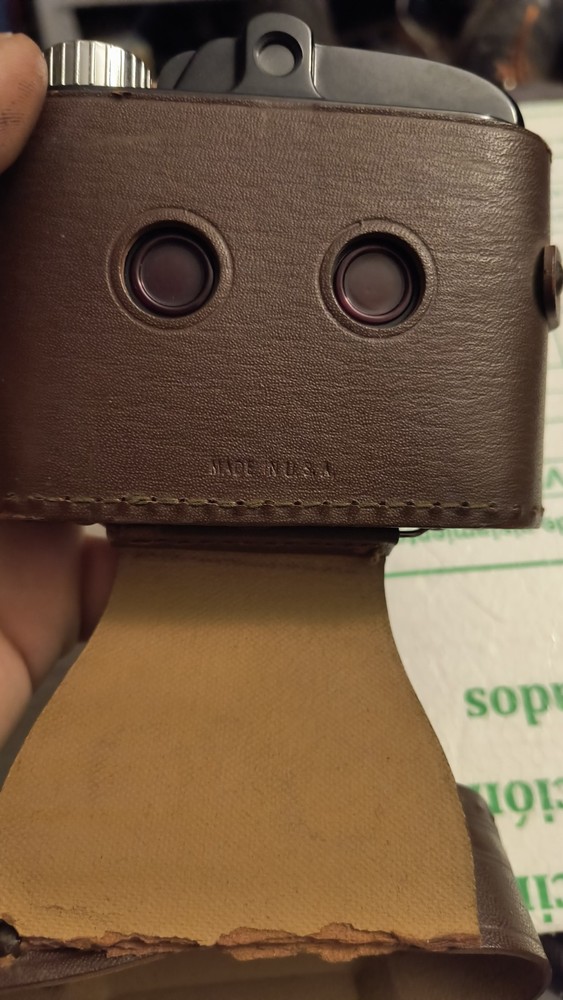 vintage becon camera with leather case