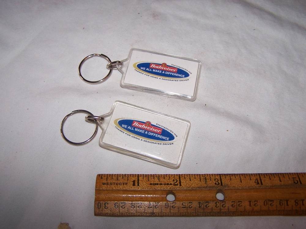 2 BUDWEISER Keychains WE ALL MAKE A DIFFERENCE Designated Drivers