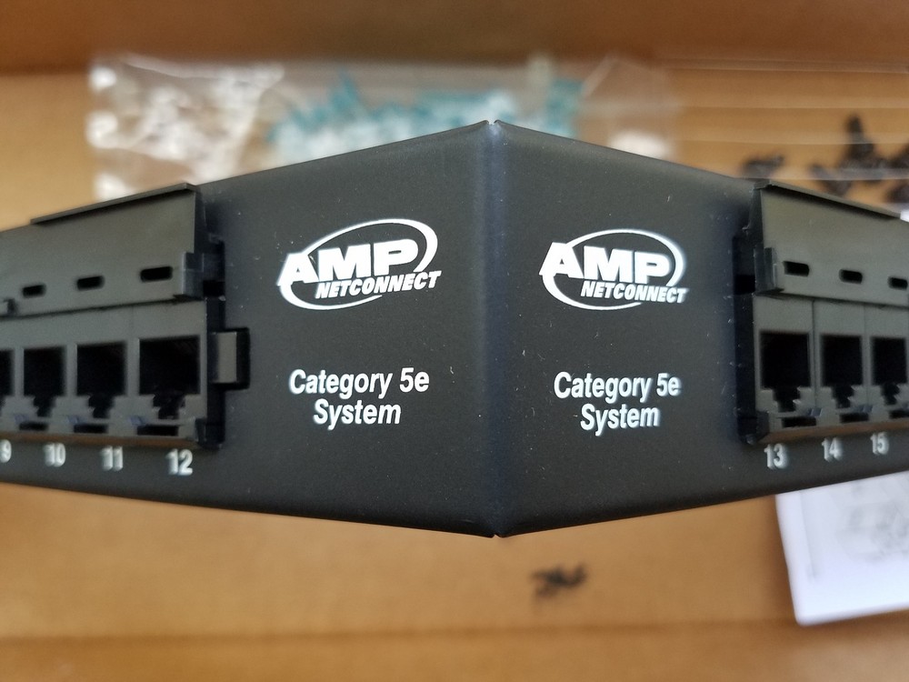 AMP 1499602-2 SL Series Patch Panel Cat5E Unshielded 24-Port Angled 1U