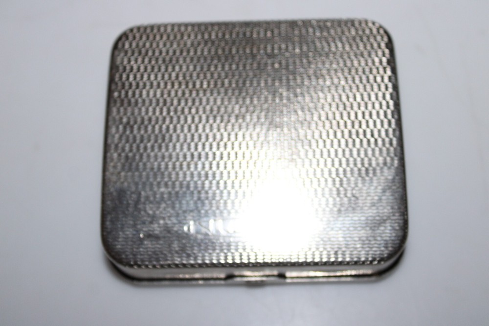 Nulite Stainless Steel Revolve Emblem Case - For Short Cigarettes Silver