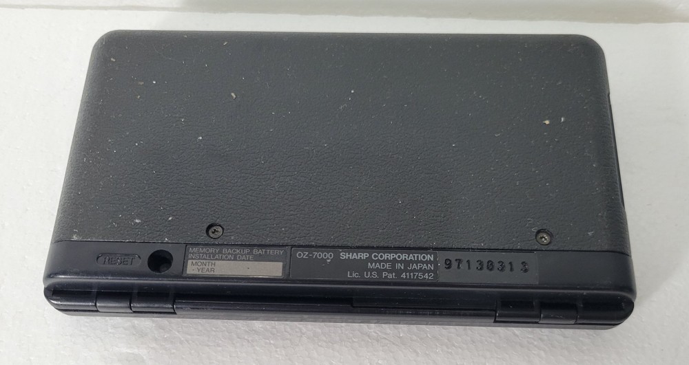 Vintage Sharp OZ-7000 WIZARD Electronic Organizer Calculator. Untested