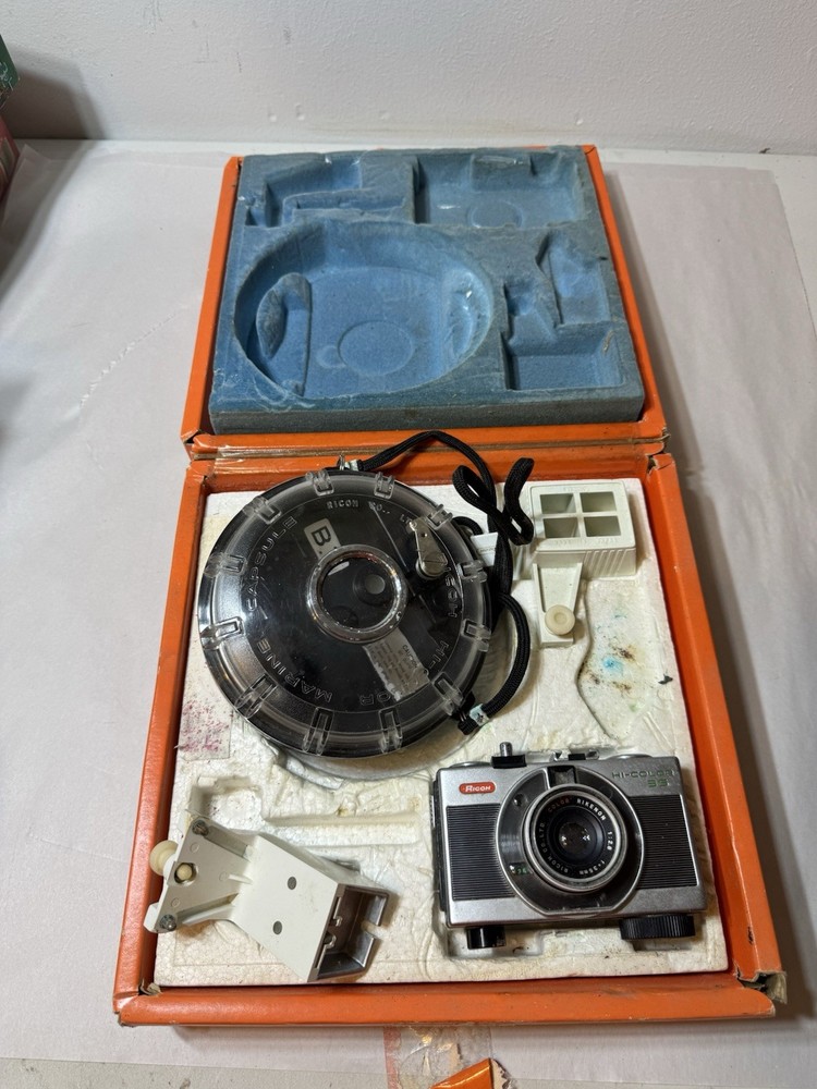 Ricoh 35 with underwater housing package