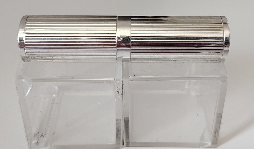 Perfume holder + makeup brush  