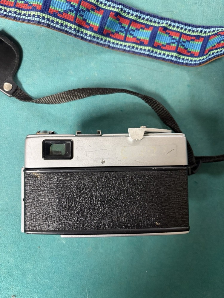 Minolta Hi-Matic 7 Black Silver Rangefinder Camera with Aztec Strap UNTESTED