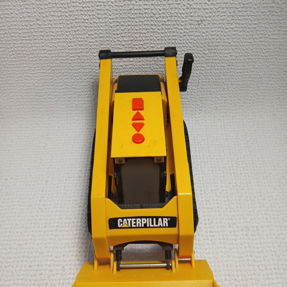 Caterpillar (CAT) toy skid steer loader, likely a "Big Builder". UNTESTED