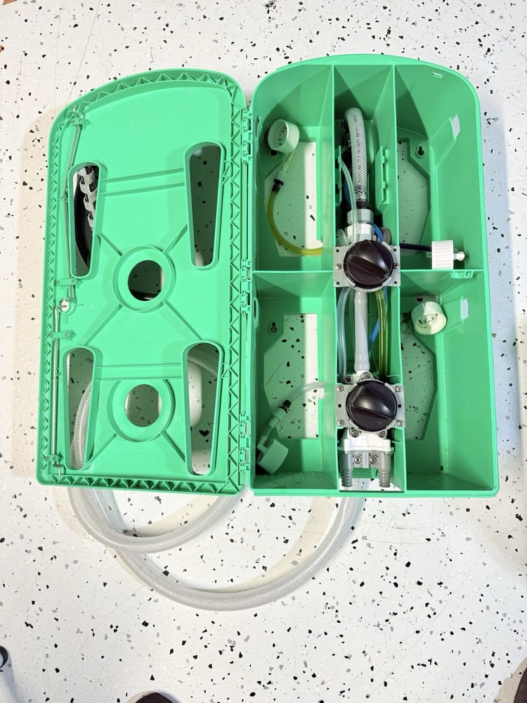 3M Flow Control System chemical dispenser, a wall-mounted.