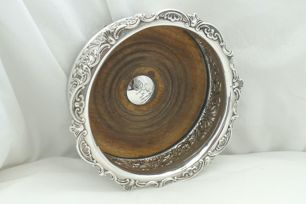RARE WILLIAM IV HM STERLING SILVER EMBOSSED WINE BOTTLE COASTER 1830