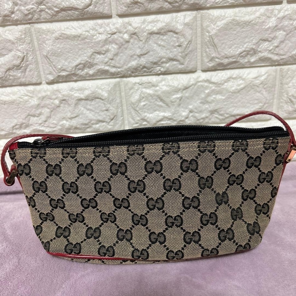Gucci Accessory Pouch GG Canvas Handbag