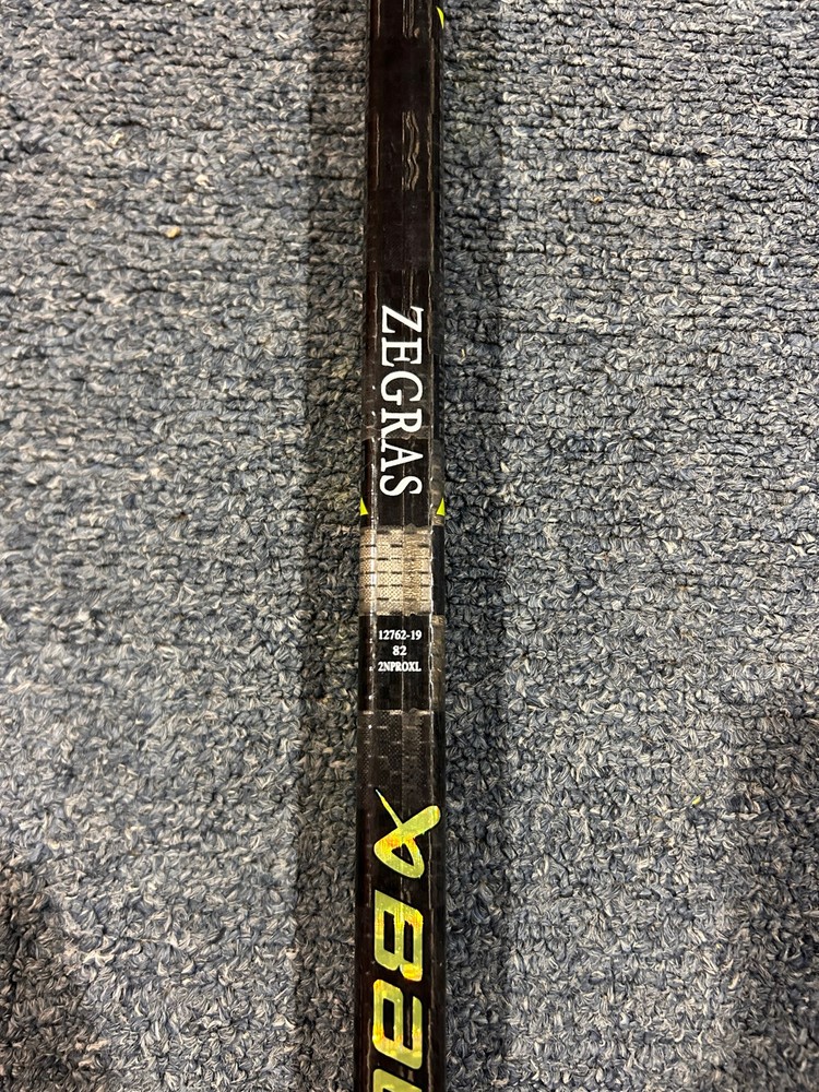 Game-Used Trevor Zegras Signed Stick