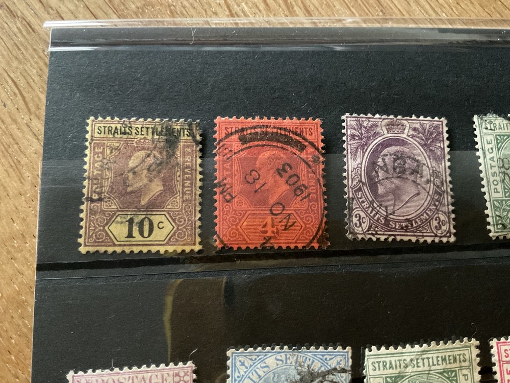 Straits settlements mounted mint or used stamps B2074