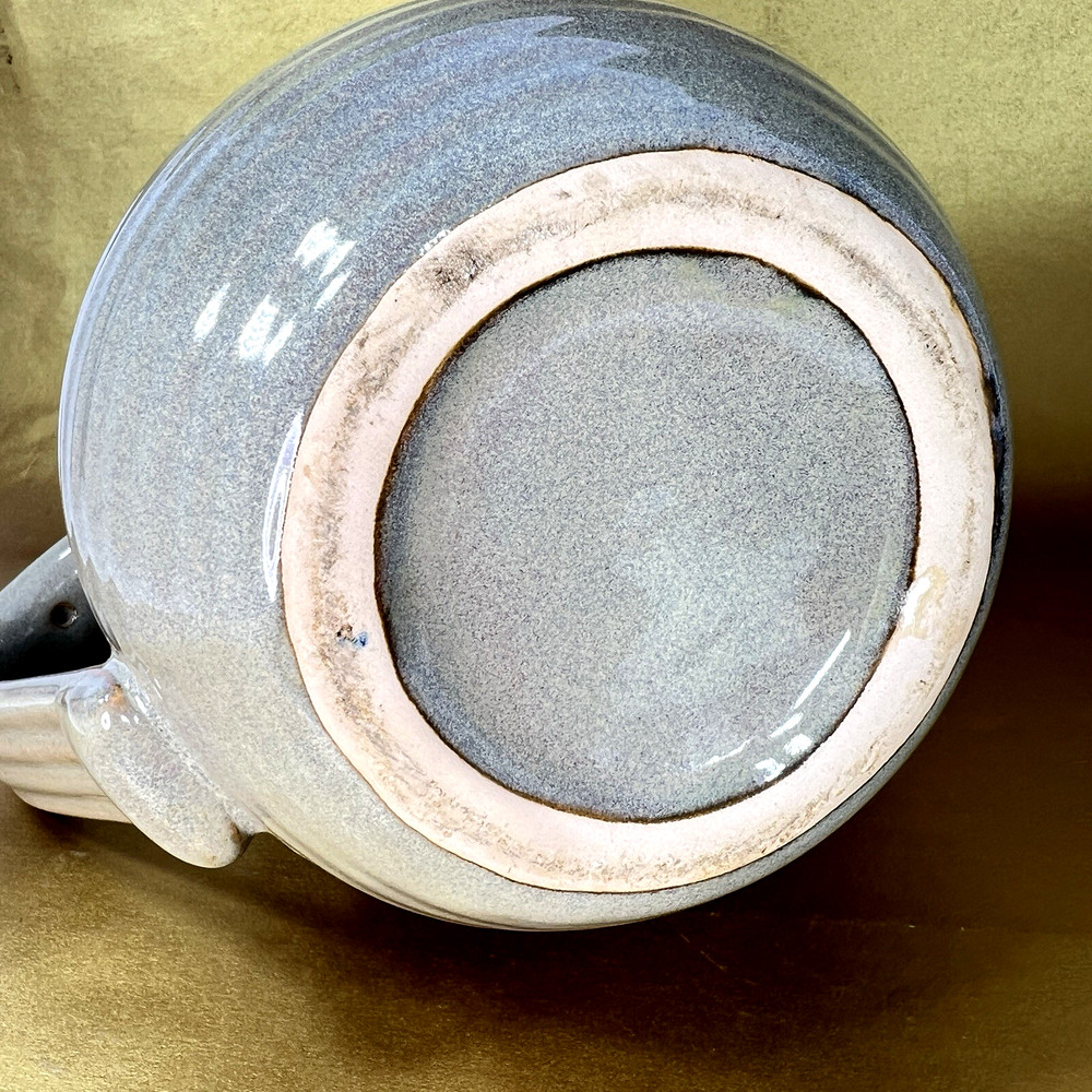 Unbranded Glazed Stoneware Pitcher embossed with fruit and glazed inside