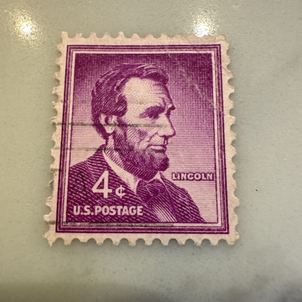 ABRAHAM LINCOLN 4 CENT PURPLE STAMP used