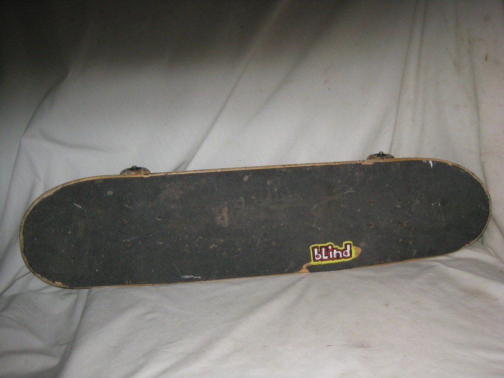 pre-owned skateboard Tensor trucks Psychedelic wheels Blind grim reaper deck