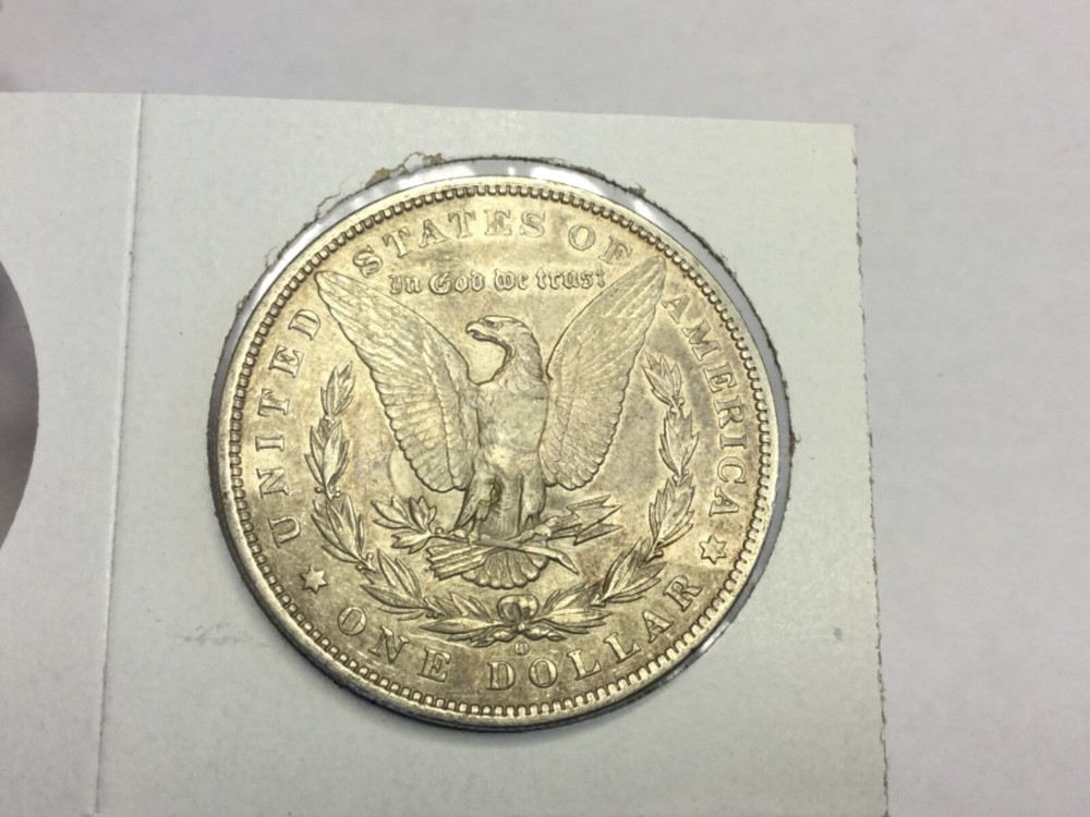 1886-O Morgan Dollar in almost uncirculated
