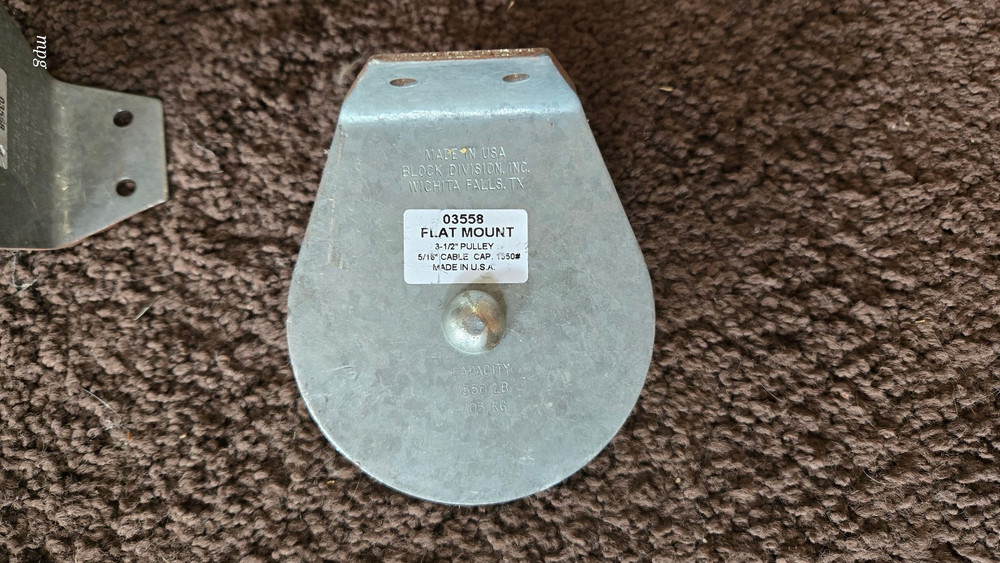 Four 3 - 1/2 inch Flat Mount Pulleys