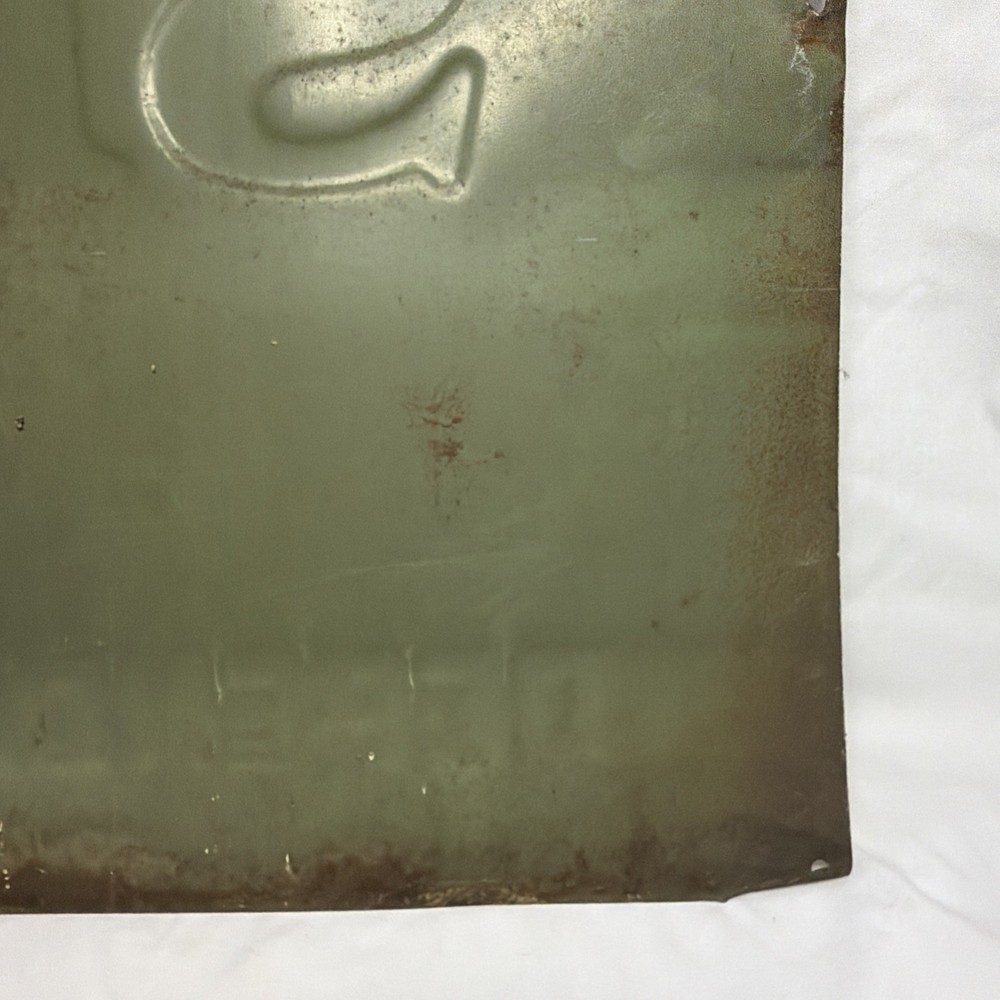 Woods Seeds Embossed Tin Sign