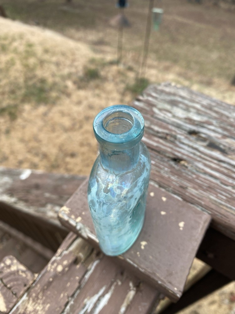 Week’s Snow Flake Blue Antique Bottle