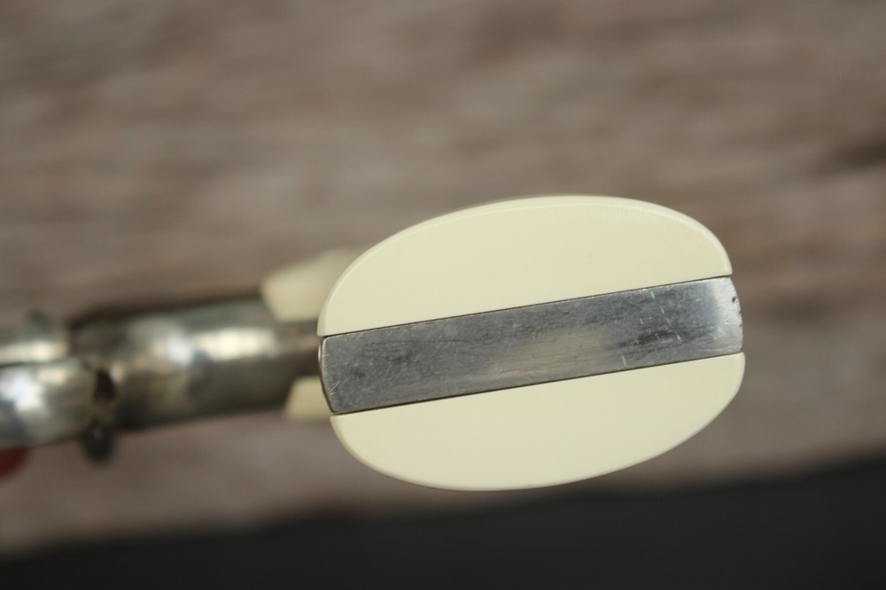 RESIN IVORY GRIPS FOR COLT PYTHON , OFFICIAL POLICE, I E FRAME # GOLD MED